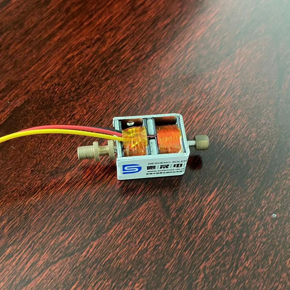 双保持式电磁铁的工作原理